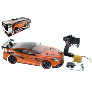 Auto RC oranžové zrychlující plast 40cm 27MHz na baterie + dobíjecí pack v krabici 56x20x24cm